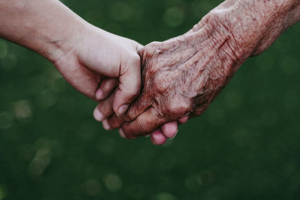 close up of of lady holding hands with young unrec 2023 11 27 05 02 23 utc