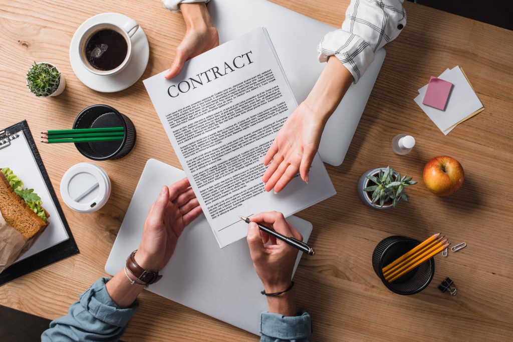 cropped shot of businesspeople signing contract at 2023 11 27 04 54 16 utc