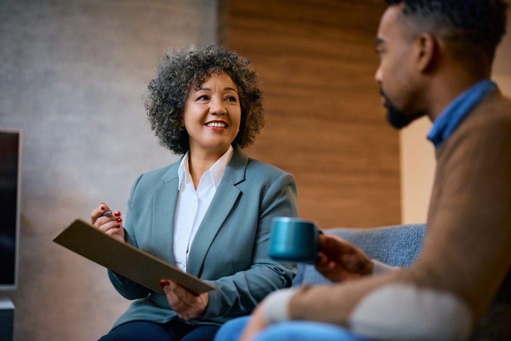 happy financial advisor having a meeting with her 2023 11 27 05 02 21 utc